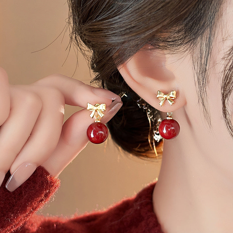 Orecchini a perno eleganti e minimalisti in resina a forma di fiocco da donna con perni in acciaio placcato, accessorio di moda di lusso