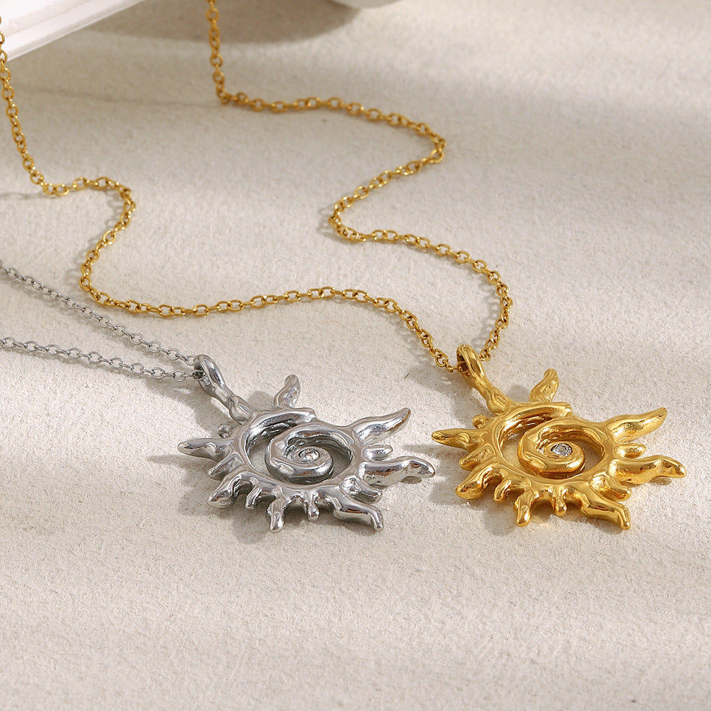 Elegante collar con colgante geométrico tipo sol para mujer en acero inoxidable con baño de oro de 18K y detalles de circonita