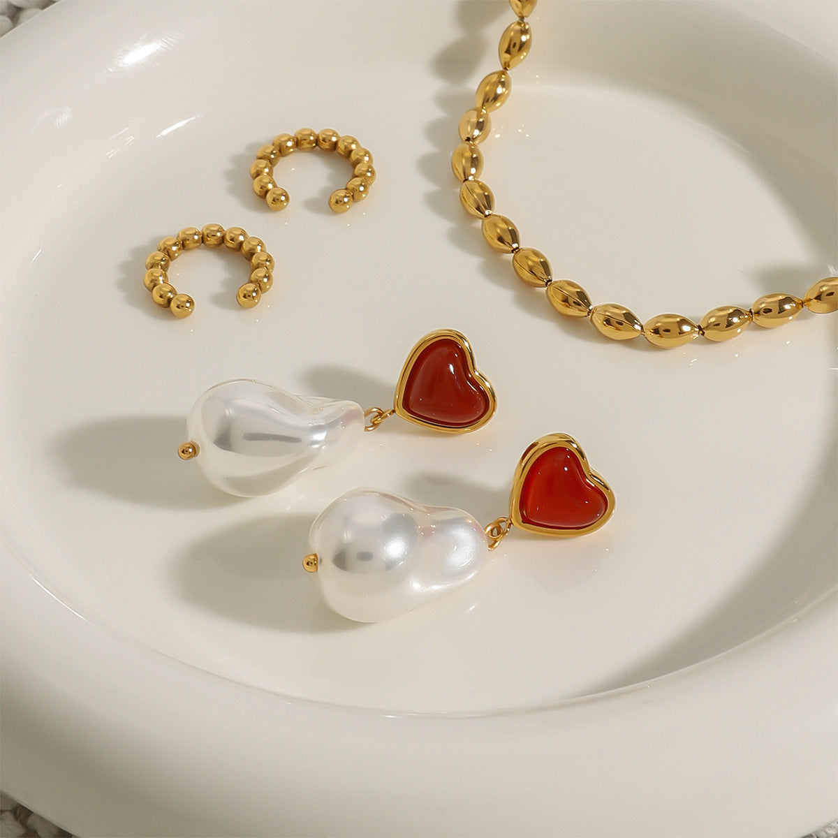 Eleganti orecchini a cuore in acciaio inossidabile con finitura placcata da donna