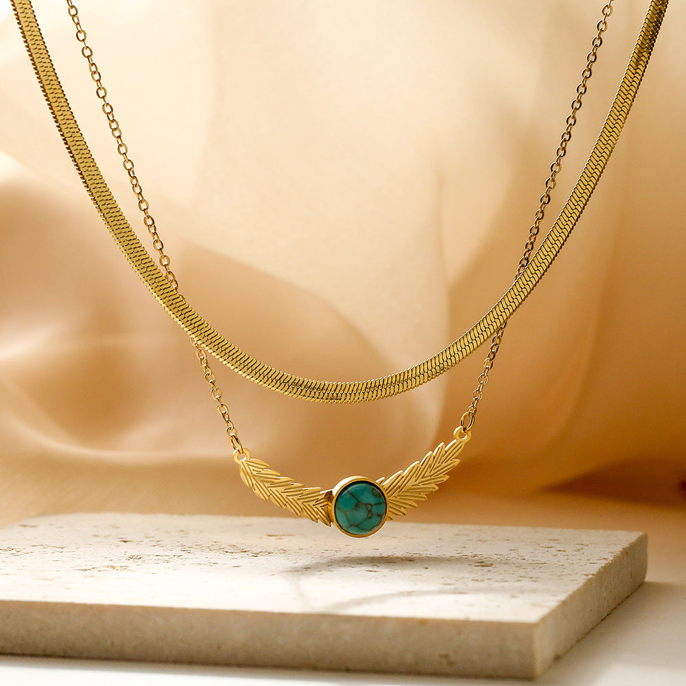 Collana da donna a doppio strato con catena alla clavicola in acciaio al titanio e ciondolo a forma di occhio geometrico smaltato minimalista