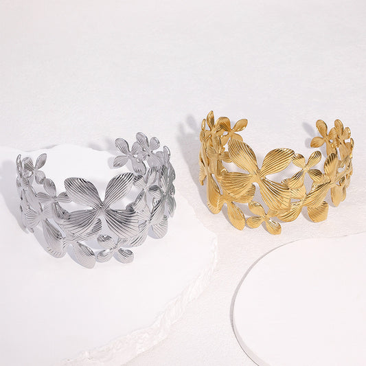 Pulsera ancha de acero inoxidable con baño de oro de 18 quilates, diseño de flor de lirio, estilo minimalista para mujer