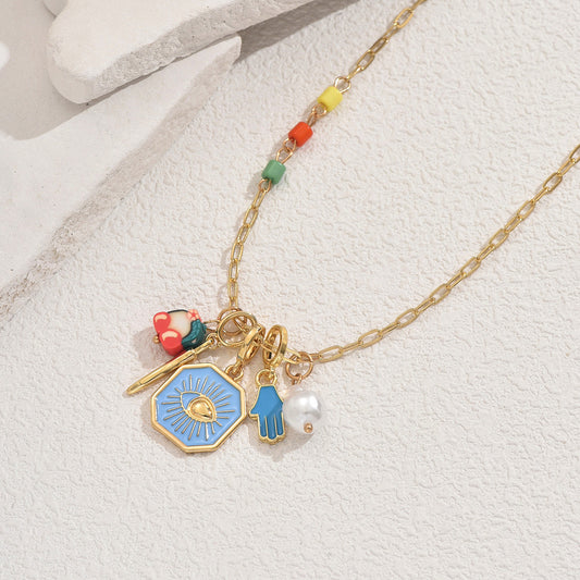 Fashionable Geometric Evil Eye Pendant Necklace for Women with Enamel Finish and Pearl Accents on Clavicle Chain