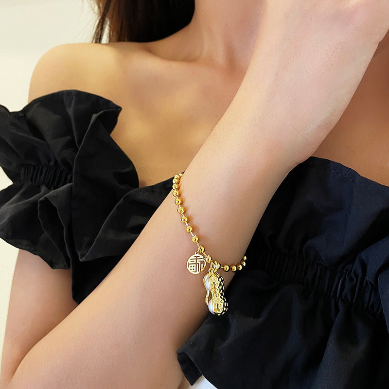 Bracciale da donna in acciaio al titanio placcato, stile cinese, con perline geometriche a forma di arachide