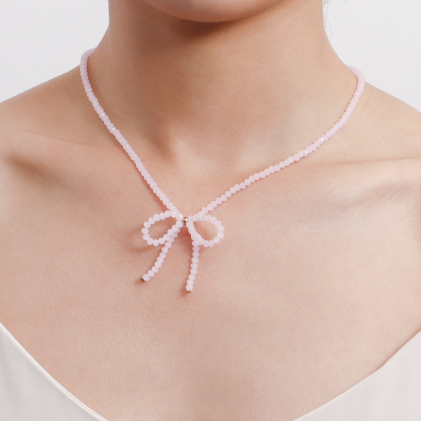 Vintage-Inspired Sweet Bowknot Choker Necklace for Women with Alloy Pendant and Geometric Design, Electroplated Finish