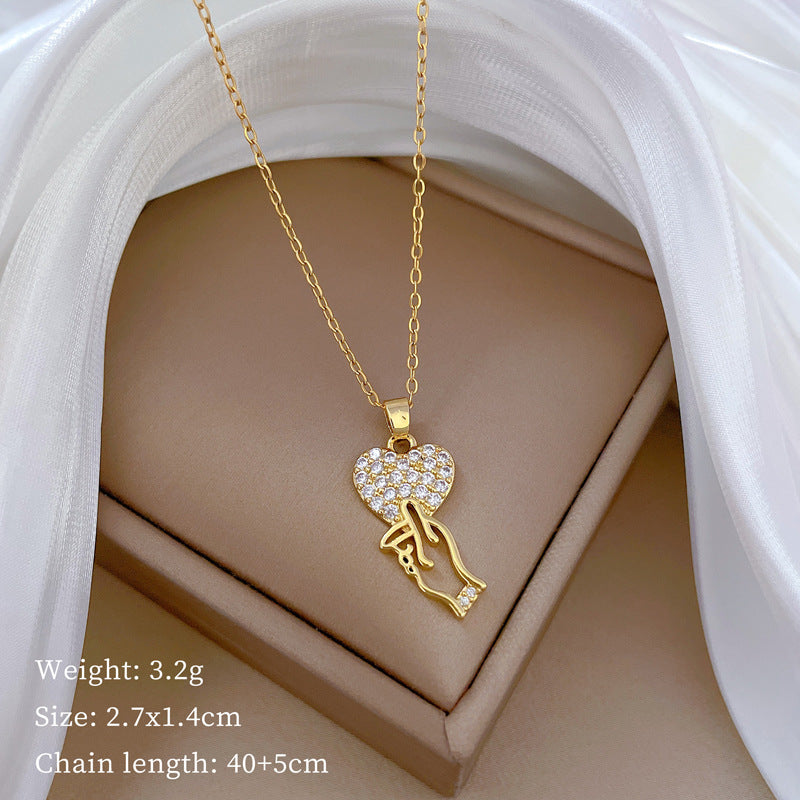 Collar minimalista de acero de titanio con forma de corazón coreano y circonitas incrustadas para mujer y hombre, cadena delicada para la clavícula