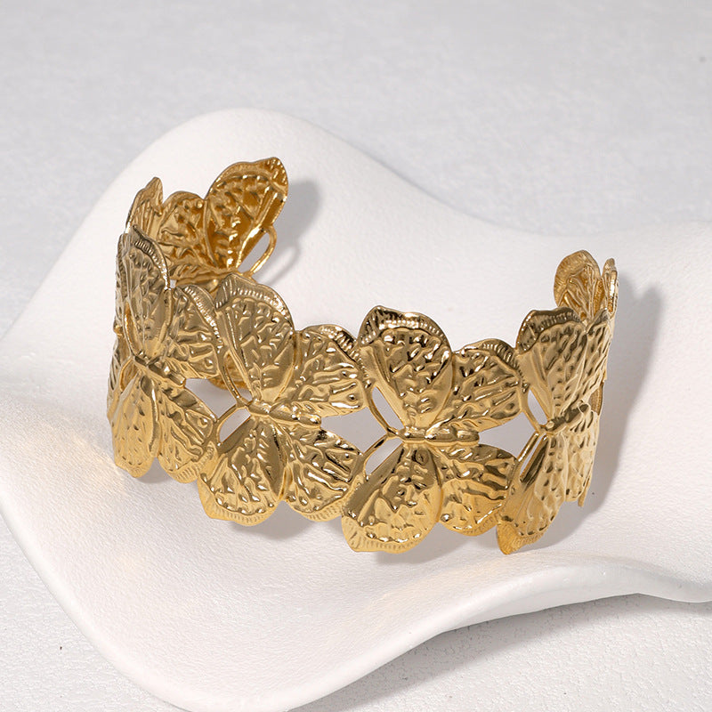 Bracciale rigido aperto a farfalla minimalista in acciaio inossidabile placcato oro 18 carati
