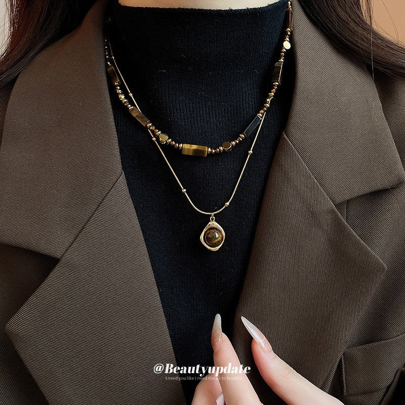 Collana pendente occhio di tigre in stile retrò con design geometrico da donna, catena a maglie color oro, accessorio minimalista di lusso