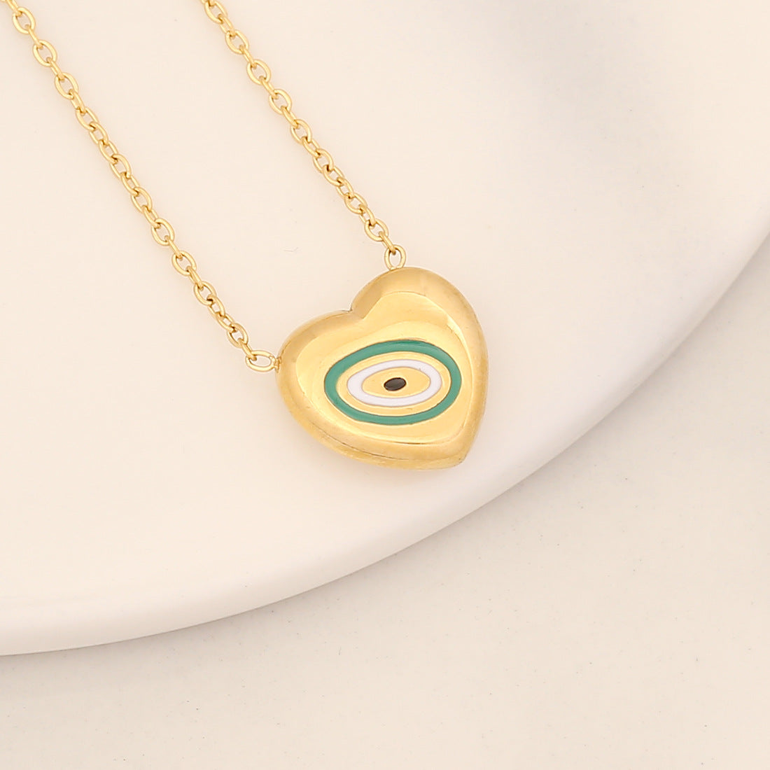 Collana con pendente a forma di occhio in acciaio inossidabile audace con finitura a olio a goccia