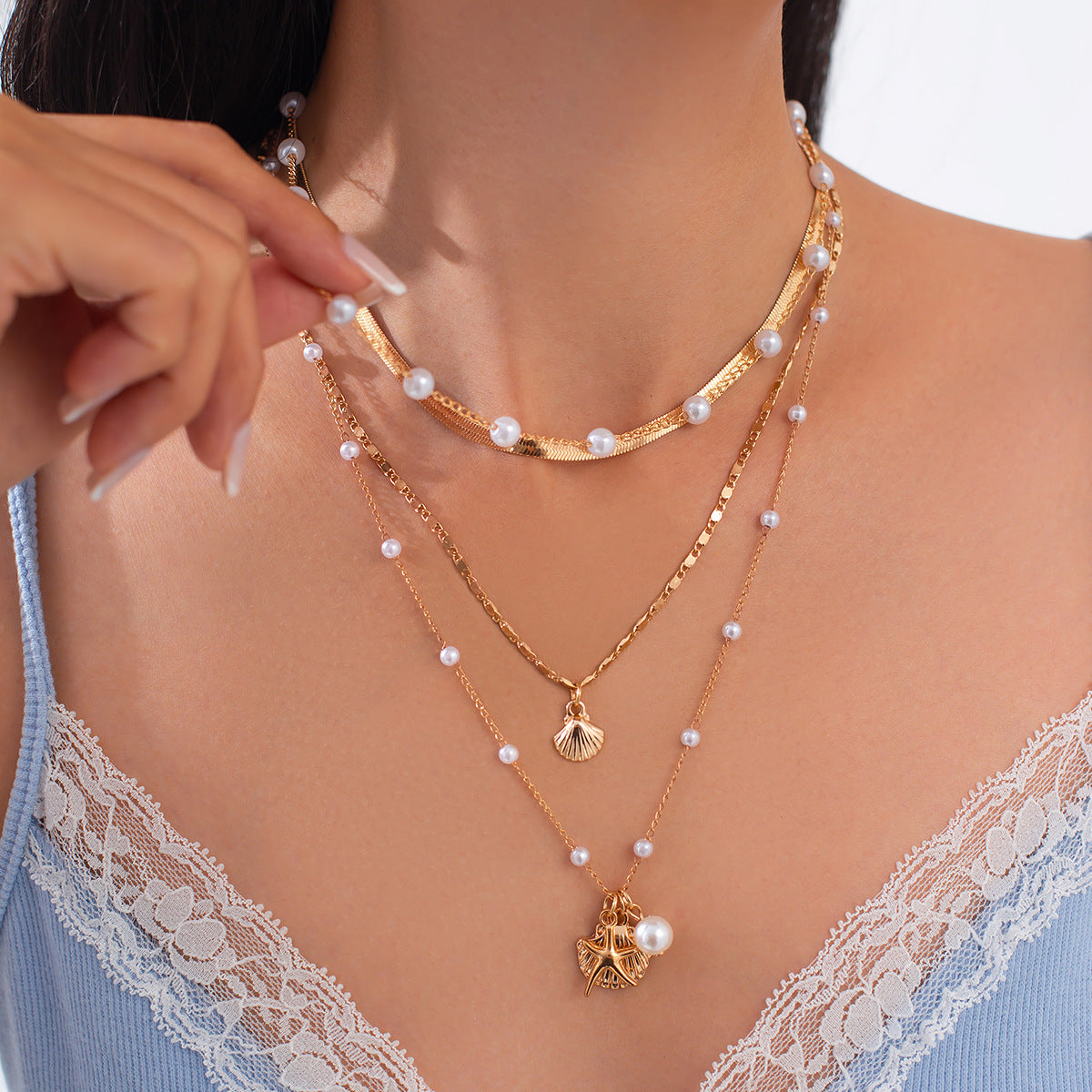 Minimalist Ocean-Inspired Star and Shell Pendant Necklace for Women with Imitation Pearl and Alloy, Plated Snake Chain