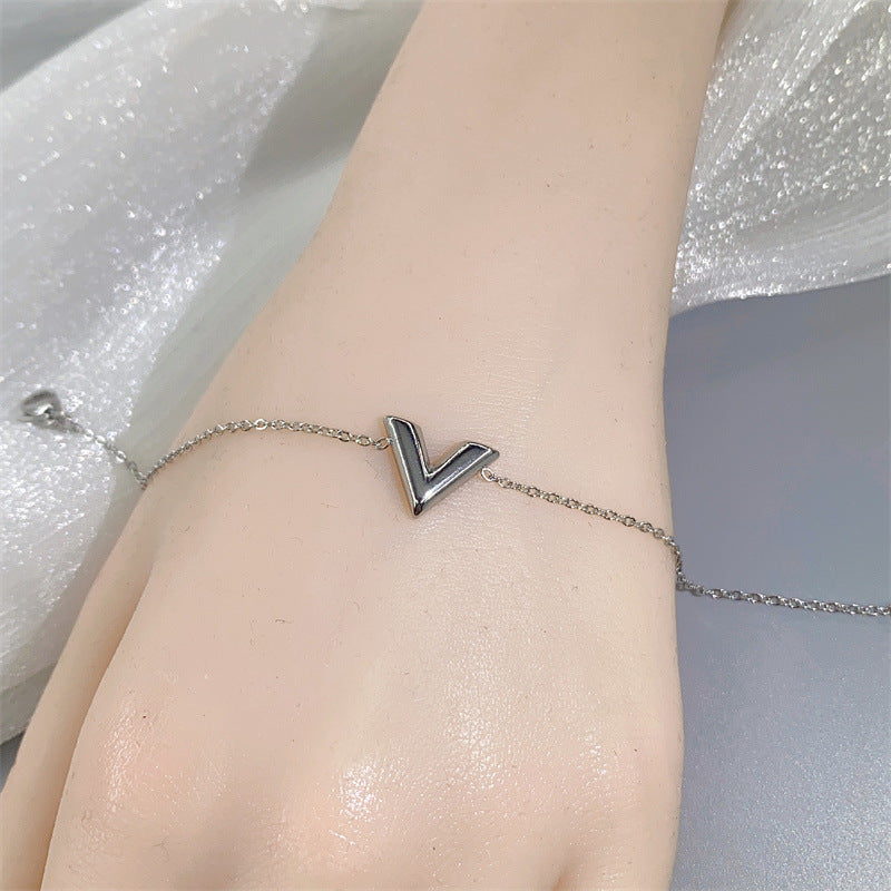Minimalist Luxe V-Shaped Pendant Necklace for Women in Titanium Steel with Gold Plating Snake Chain