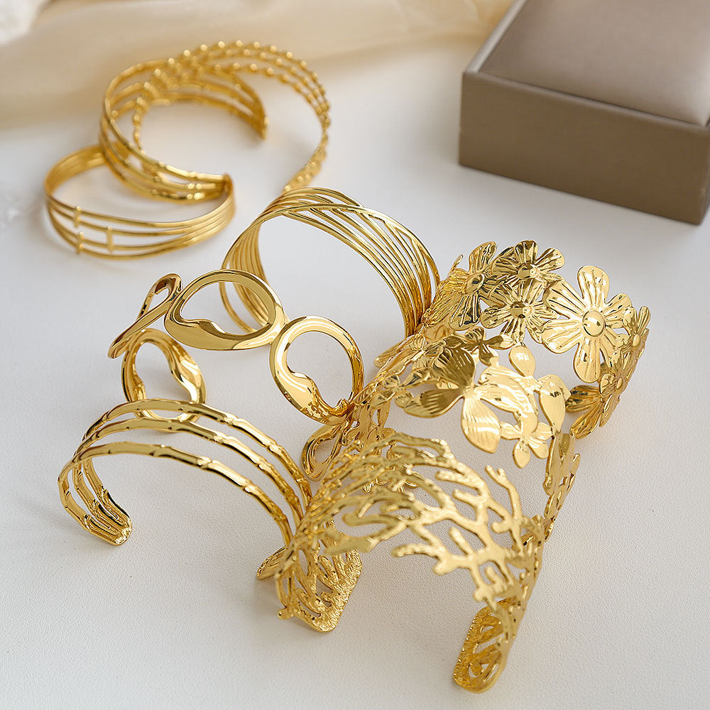 Bracciale Minimalista Ispirato alla Francia in Acciaio Inossidabile con Trafori a Motivi Floreali di Foglie e Girasoli