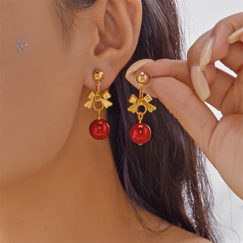 Pendientes de campana con lazo y borla navideños de moda para mujer, de aleación con acabado chapado