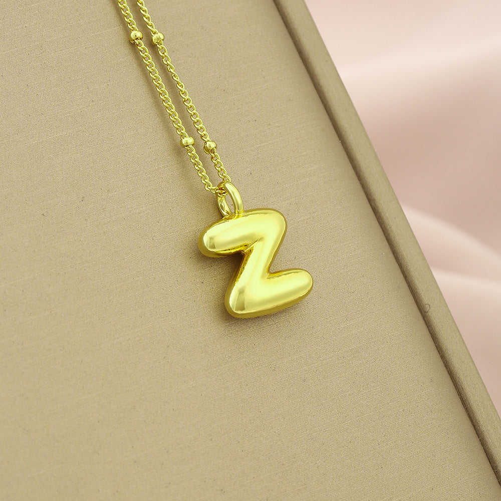 Collar Colgante con Inicial Minimalista para Mujer en Cobre con Acabado Galvanizado Cadena Ajustable para Clavícula