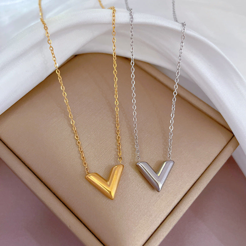 Collana con pendente a clavicola in acciaio al titanio con motivo floreale, dolce e fresco, dalla forma geometrica