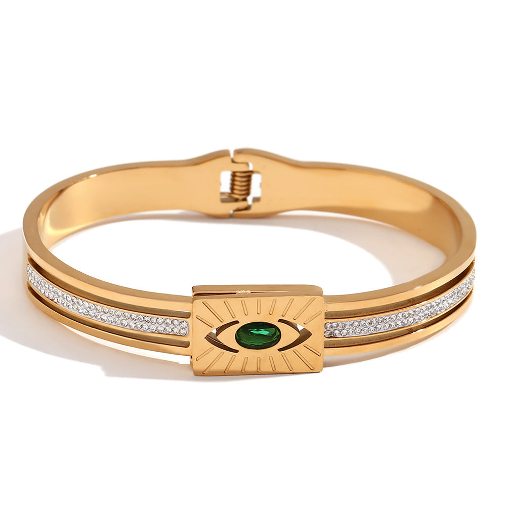 Bracciale minimalista di tendenza in acciaio inossidabile con placcatura in oro 18 carati e ciondolo a forma di occhio di Nazar micro-incastonato su chiusura a molla