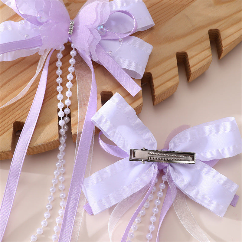 Pinza de pelo en forma de lazo de estilo natural para niños con detalles de volantes y malla hecha de resina plástica