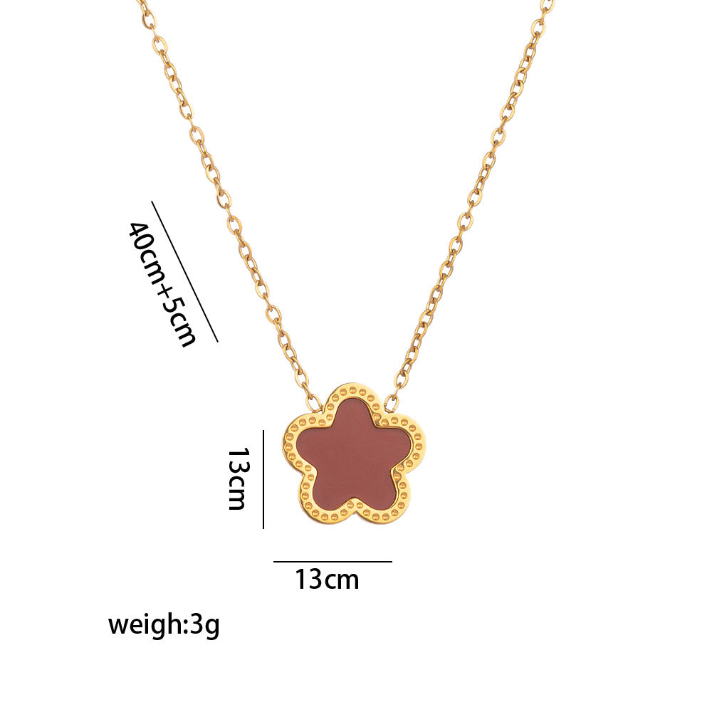 Collana pendente con fiore di pruno minimalista in madreperla da donna con intarsio di strass e catena a serpente in acciaio al titanio