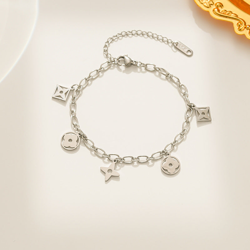 Luxury Style Rhombus-Shaped Titanium Steel Plated Tassel Bracelet for Women with Clover Cutout Design