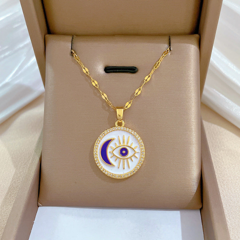 Collar minimalista de mujer con colgante de ojo redondo en acero de titanio con acabado chapado y delicada cadena de medallón