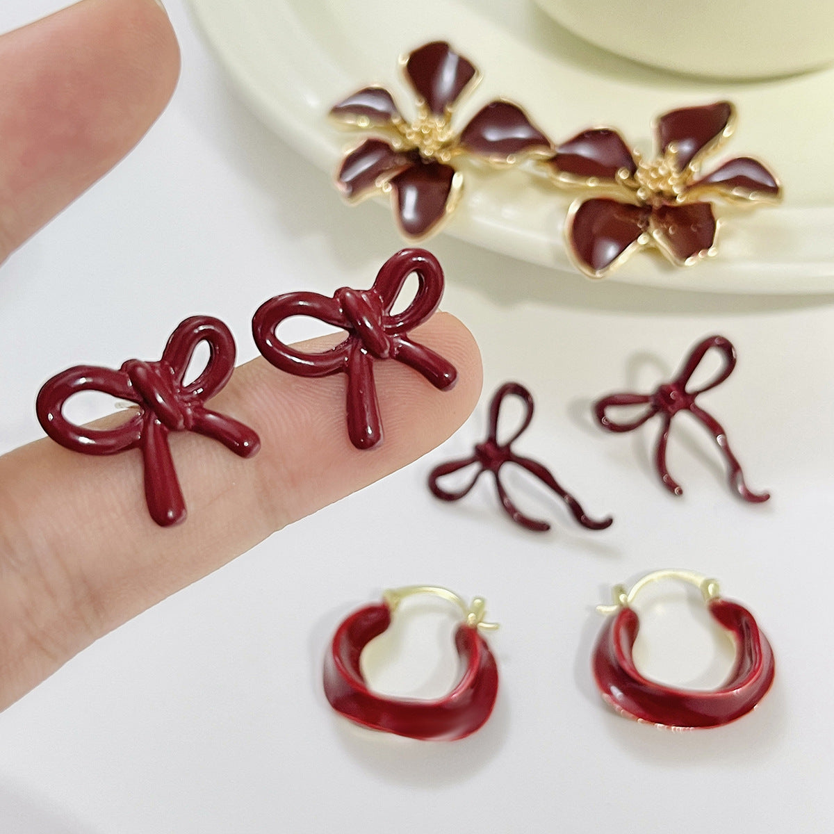 Minimalist Floral Bow Earrings for Women with Enamel Finish in Alloy Metal
