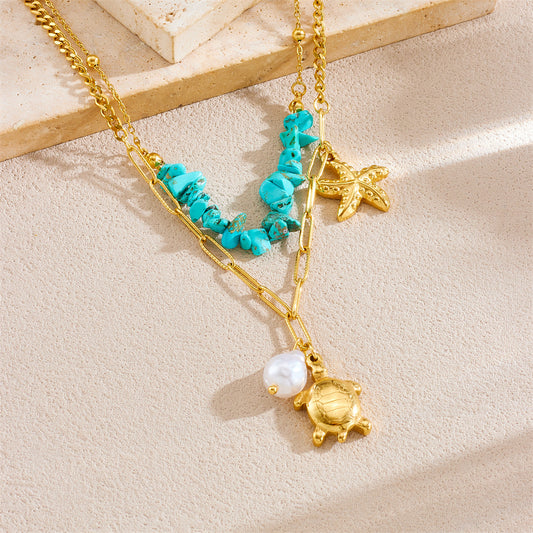 Collana con ciondolo personalizzato a forma di tartaruga e stella marina in acciaio inossidabile con strass blu su catena a maglie per donna