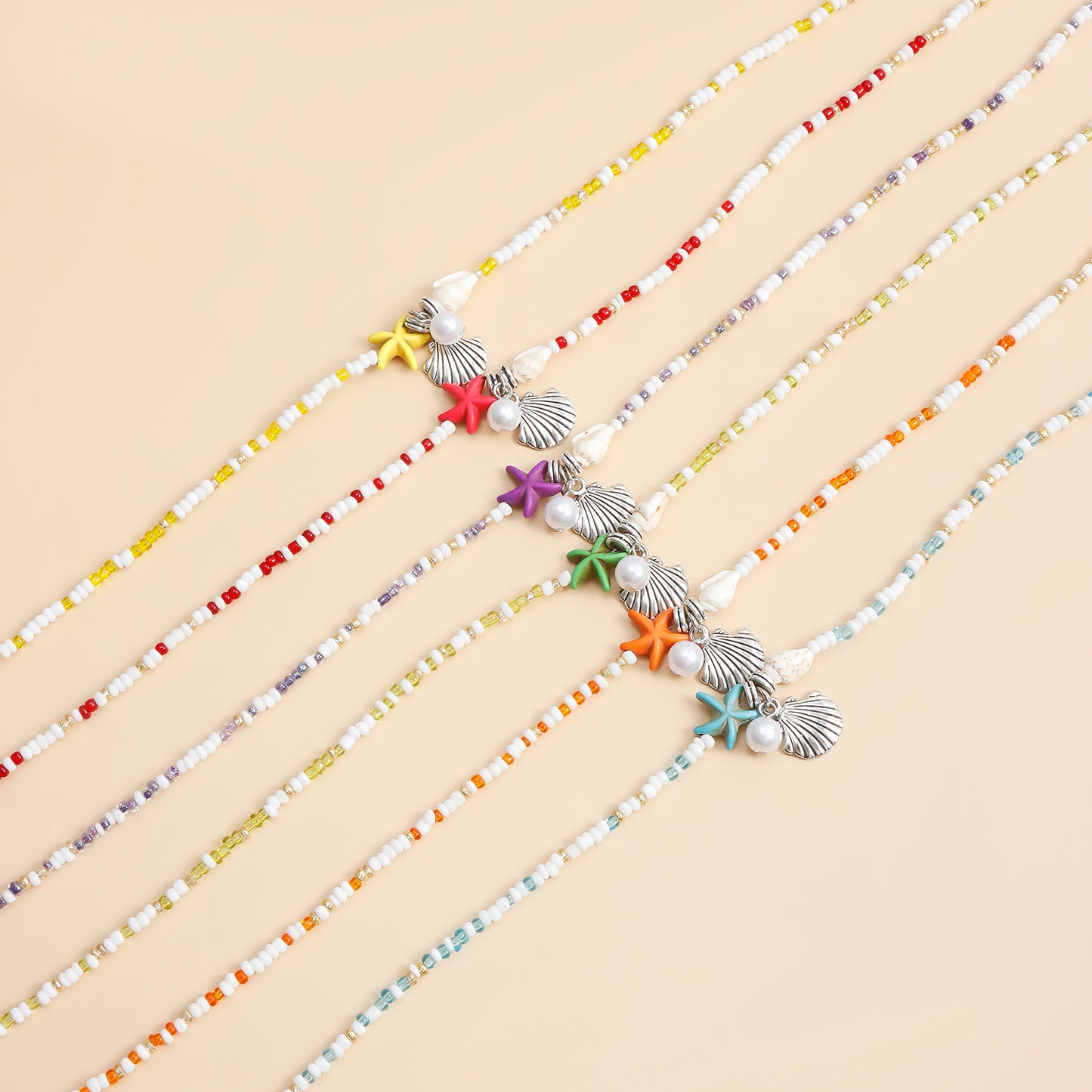 Bohemian Starfish Pendant Necklace for Women with Geometric Seashell Beads and Alloy Plated Clavicle Chain