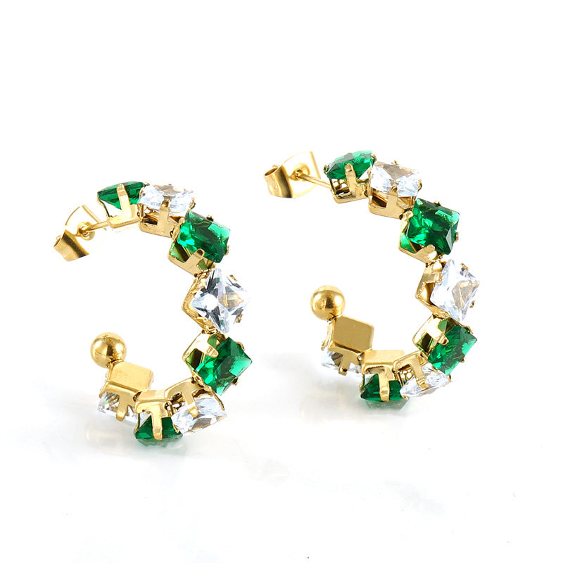 Orecchini a perno da donna alla moda geometrici in acciaio al titanio placcato oro 18K con zirconi