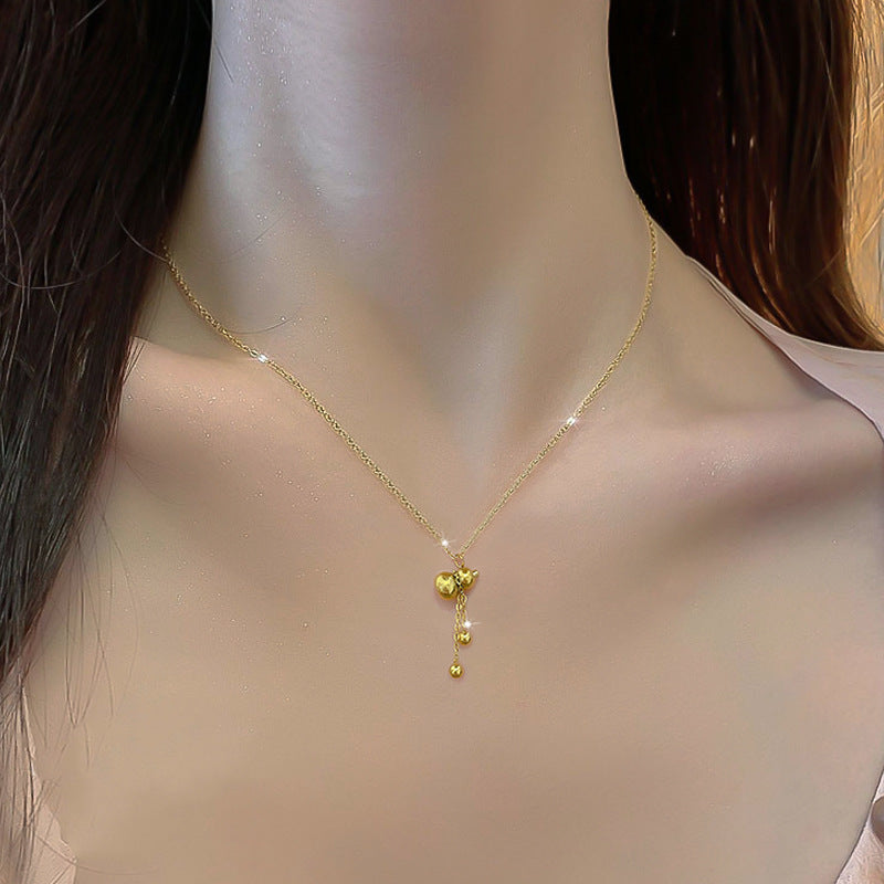Collana girocollo con ciondolo a zucca geometrica da donna in acciaio al titanio con strass intarsiati, fresca e dolce