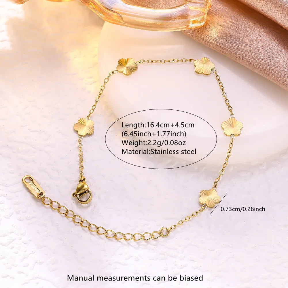 Elegante bracciale da donna in acciaio inossidabile placcato oro 18 carati con motivo floreale