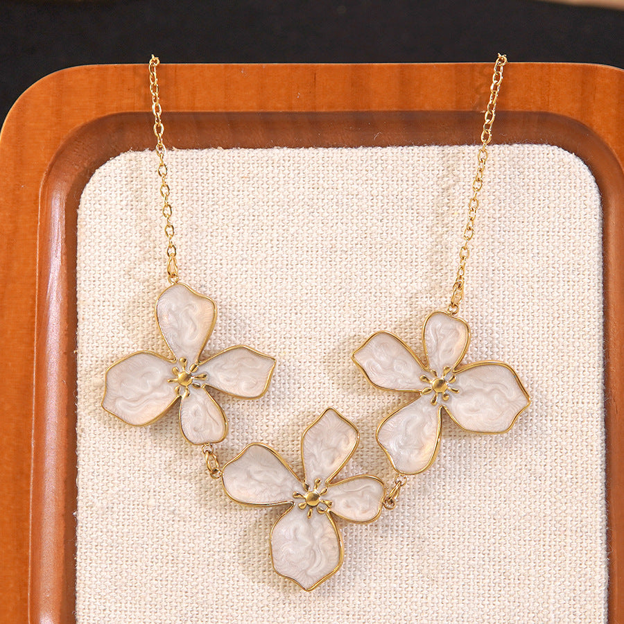 Set di collana e orecchini in acciaio inossidabile da donna con piante floreali a goccia, eleganti e minimalisti