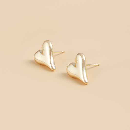 Pendientes de aleación con forma de corazón simétrico de estilo vintage y acabado chapado para mujer