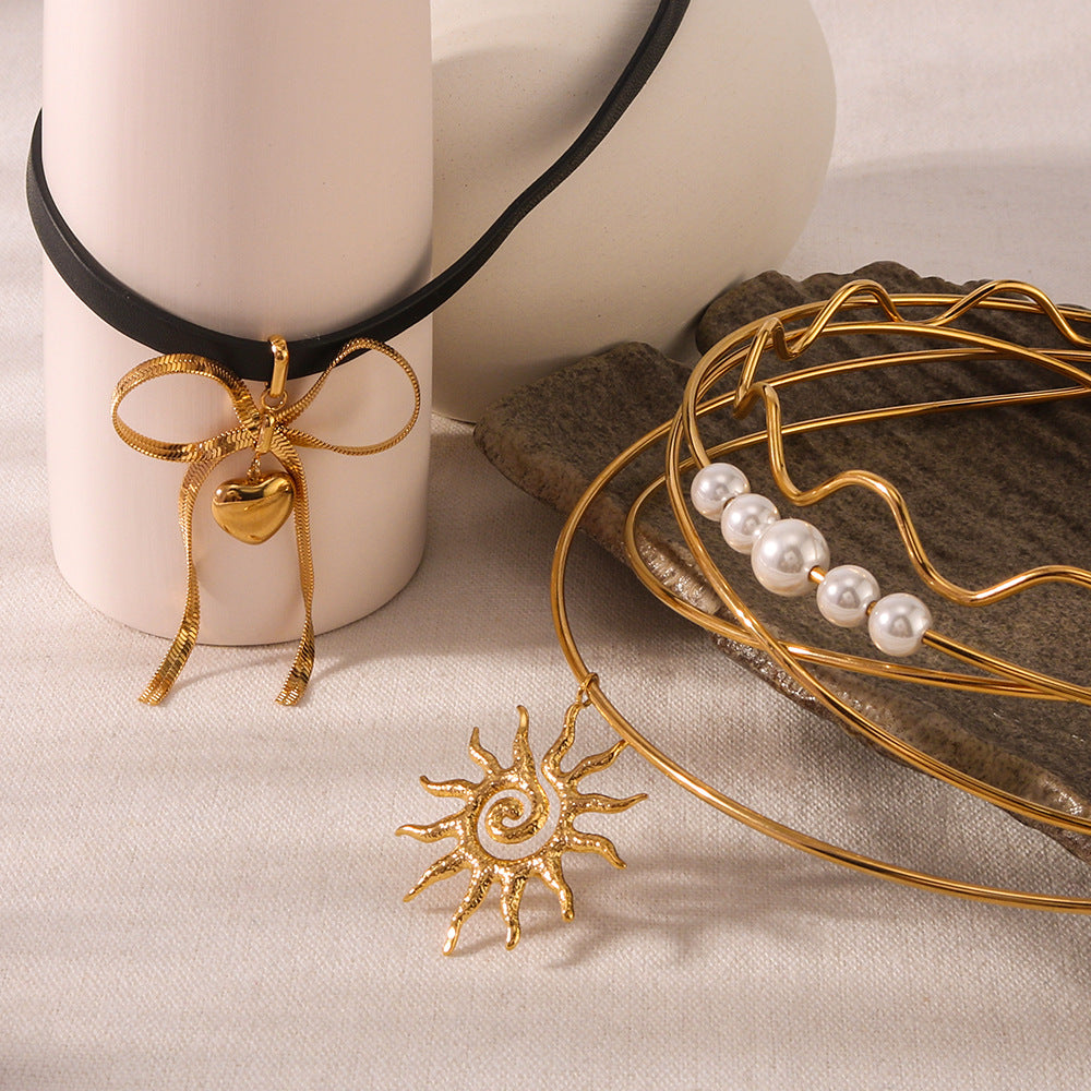 Minimalist Wave-Shaped Sunflower Bowknot Pearl Pendant Necklace in Stainless Steel with 18K Gold Plating for Women