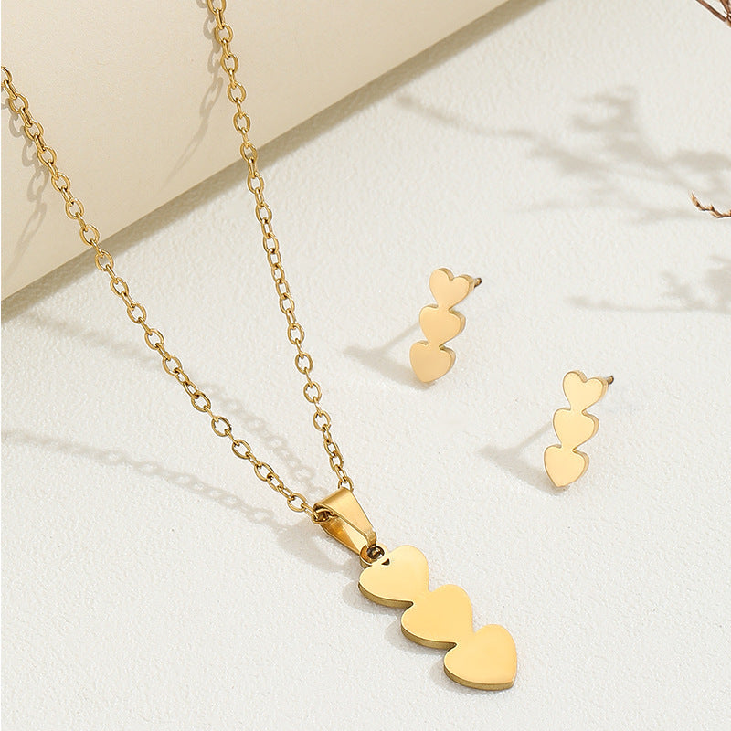 Conjunto de collar y pendientes chapados en cobre con forma de corazón minimalista y borlas para mujer
