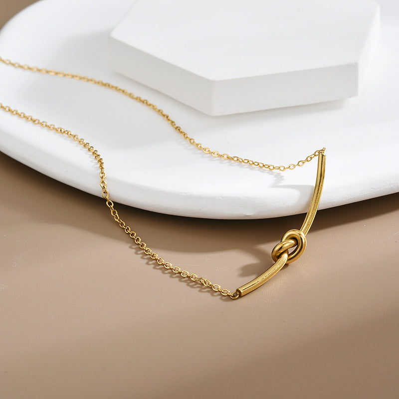 Collana Minimalista Geometrica Placcata in Acciaio Titanio con Ciondolo a Fiocco per Donna, Catena Regolabile