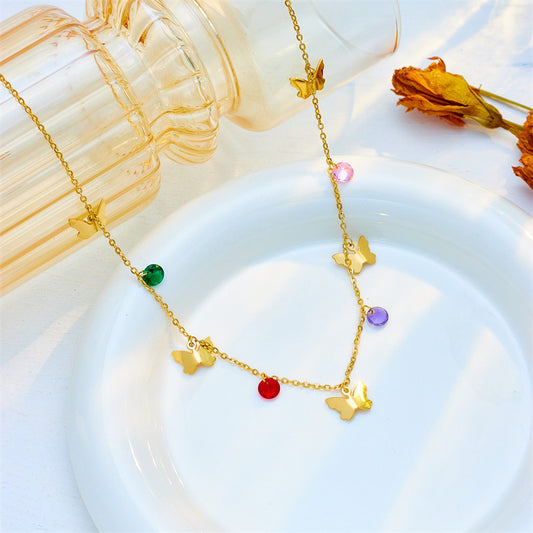Collana con pendente a farfalla in acciaio inossidabile con finitura placcata da donna, design minimalista e versatile