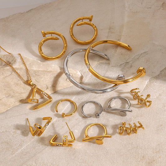 Aretes de acero inoxidable geométricos con pedrería y baño de metal para mujer