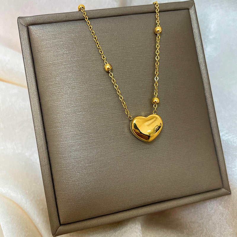 Collana con ciondolo a goccia in rame placcato oro 18 carati con micro-pavé e catena a onda in acciaio al titanio, design originale