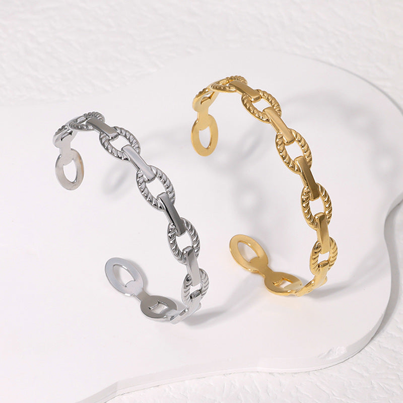 Brazalete geométrico de acero inoxidable con acabado de acero de titanio, galvanizado para una elegancia que no se desvanece, accesorio diario moderno y sofisticado