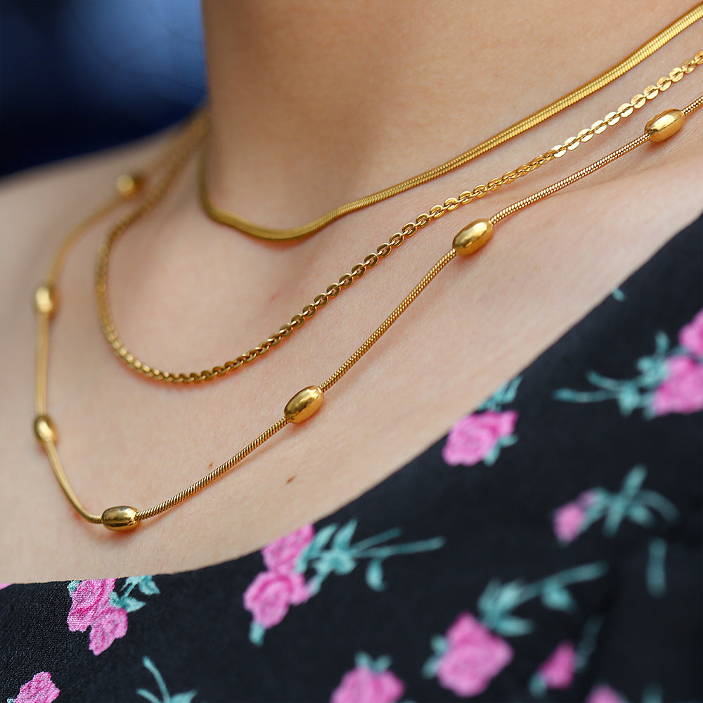 Collana a catena a serpente a triplo strato in acciaio inossidabile geometrica minimalista da donna con finitura placcata