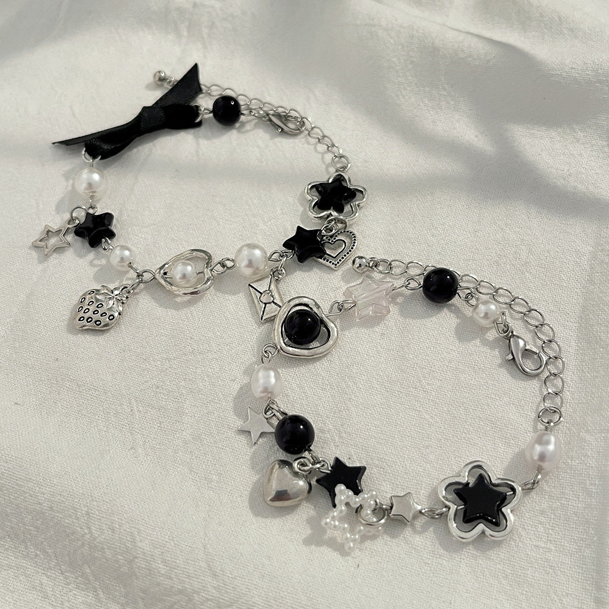 Elegante set di braccialetti a forma di stella con fiocco e ciondolo a cuore in lega con finitura placcata per donna