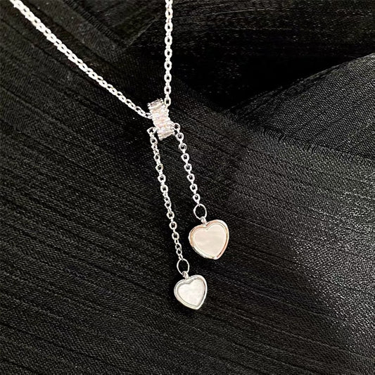 Chic Seashell Heart Pendant Necklace for Women with Plated Copper and Tassel Detail on O-Chain