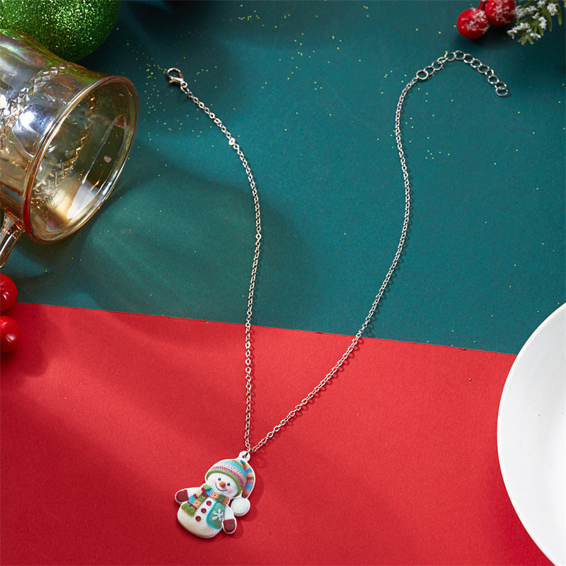 Conjunto de collar con colgante de muñeco de nieve lindo y colorido con temática navideña, con colgante acrílico y diseño impreso, unisex, para llevar en vacaciones