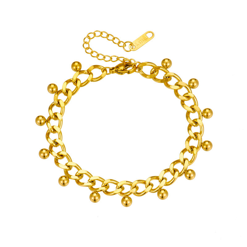 Bracciale da donna stile minimalista retrò con nappine a sfera in acciaio al titanio e finitura galvanizzata