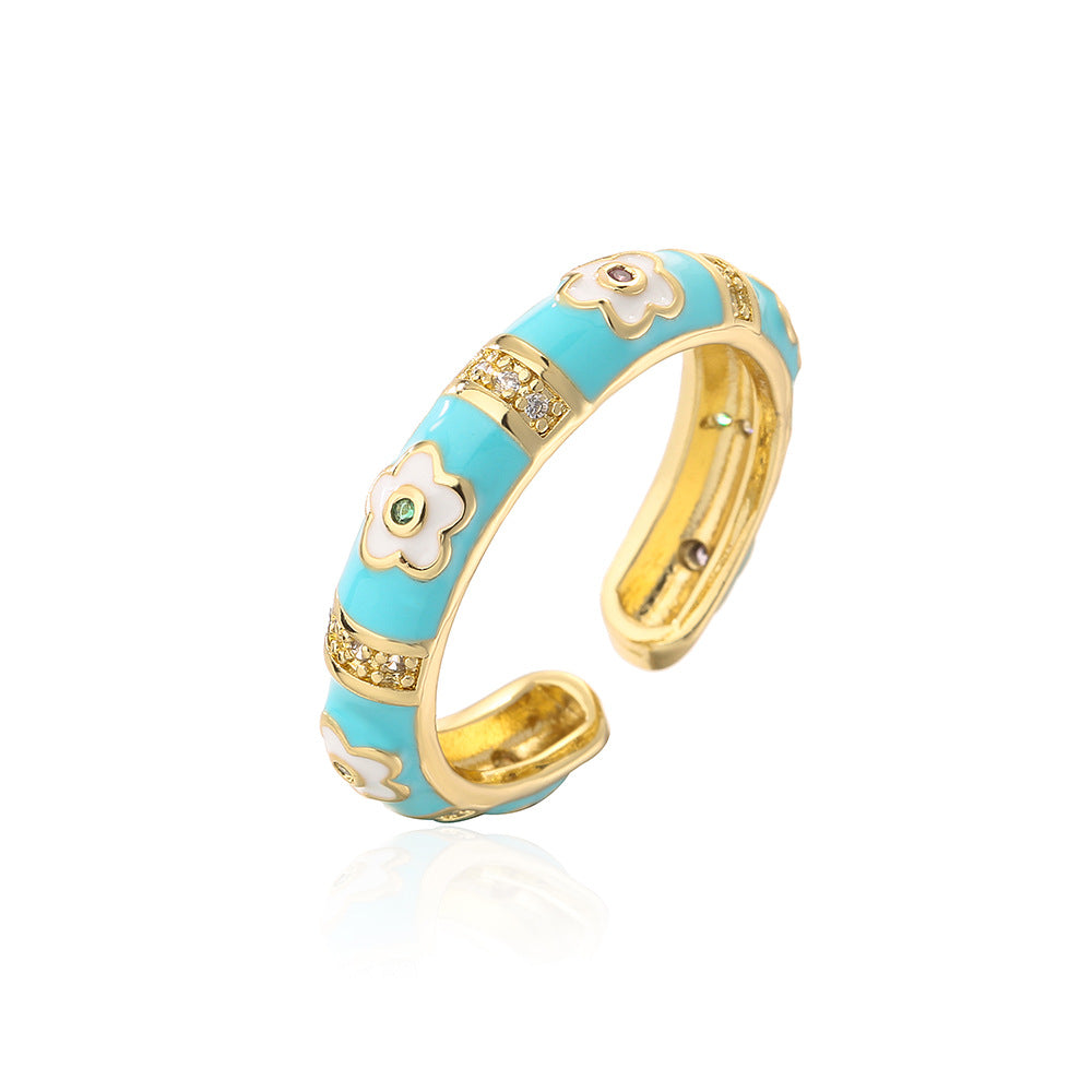 Anillo de flores geométricas irregulares estilo bohemio para mujer, hecho de cobre con chapado en oro de 18 quilates y acabado esmaltado