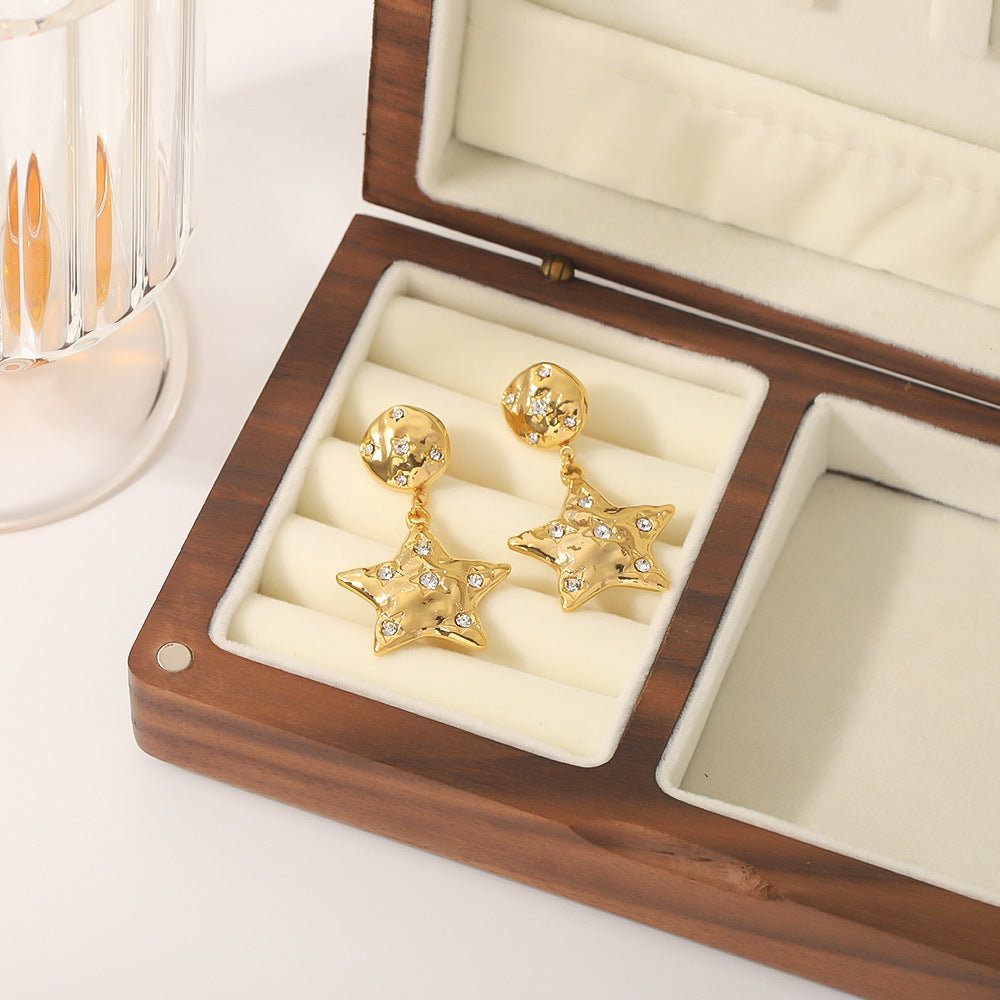 Orecchini minimalisti a forma di stella in acciaio al titanio con intarsio di strass e placcatura sottovuoto in oro 18 carati da donna