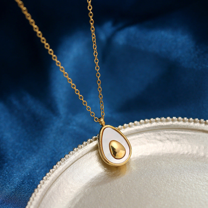 Minimalist Avocado Shell Pendant Necklace for Women in Titanium Steel with Gold Plating on Cross Chain