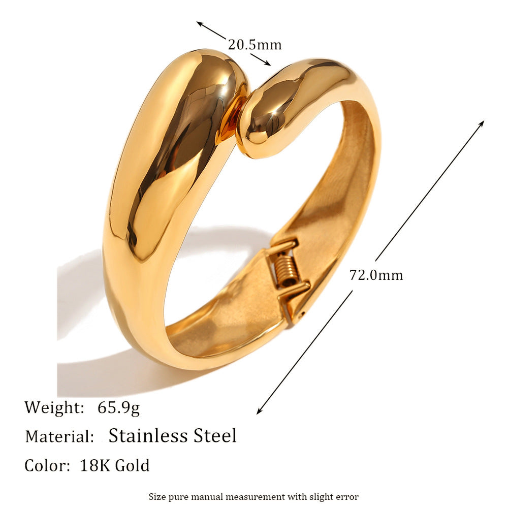 Pulsera minimalista extragrande de acero inoxidable con baño de oro de 18K y diseño de doble cabeza de serpiente para mujer