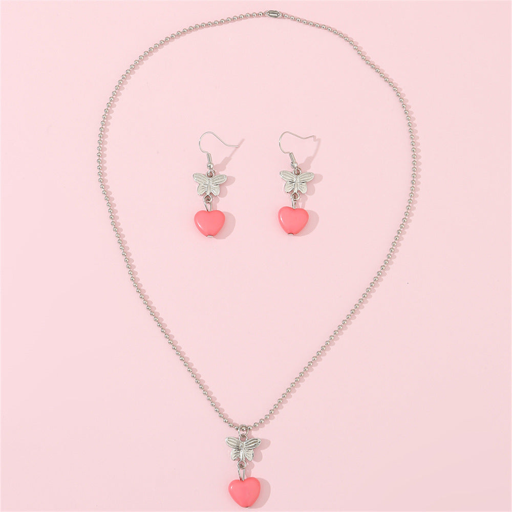 Set Collana con Ciondolo a Farfalla e Cuore in Resina con Catena di Perline per Bambini