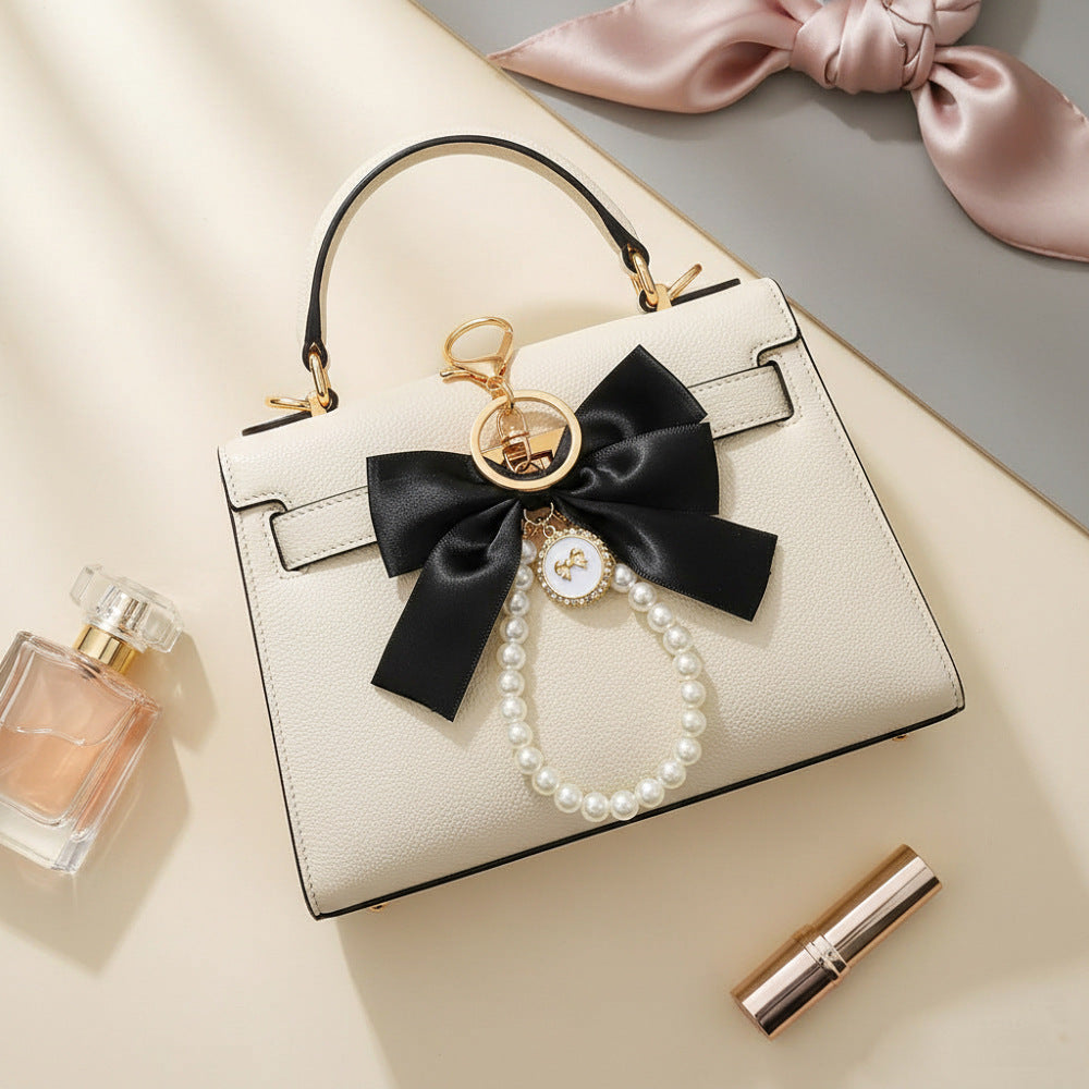 Sweet Cartoon Bow Pearl Zinc Alloy Keychain Bag Charm