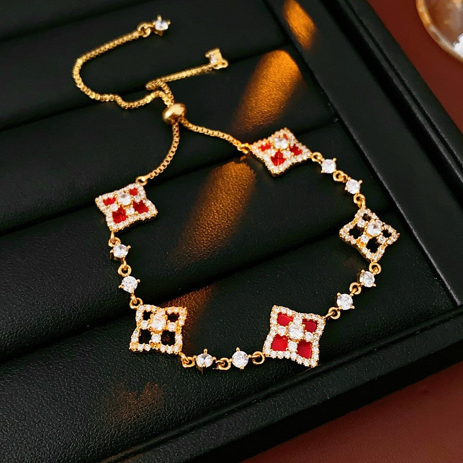 Elegante bracciale da donna con fiore geometrico e accenti in zircone, in rame placcato, stile trendy da ufficio, gioiello versatile e lussuoso per la mano